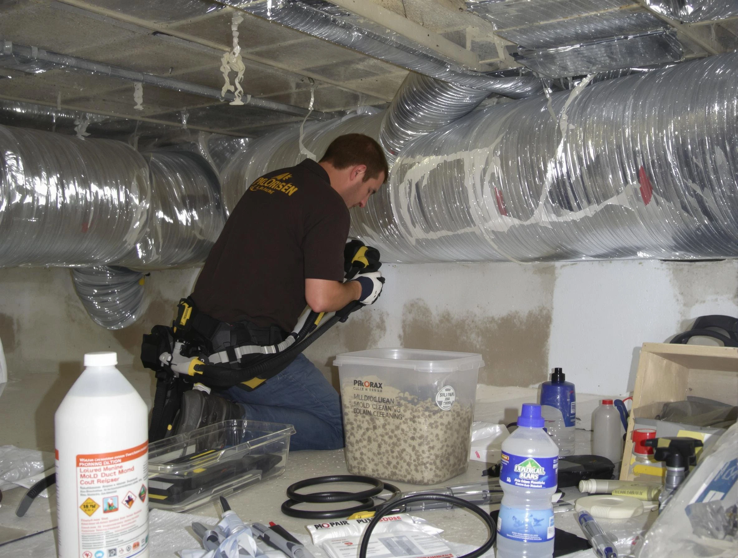 Dallas Air Duct Cleaning specialist performing professional mold removal from air ducts in Dallas